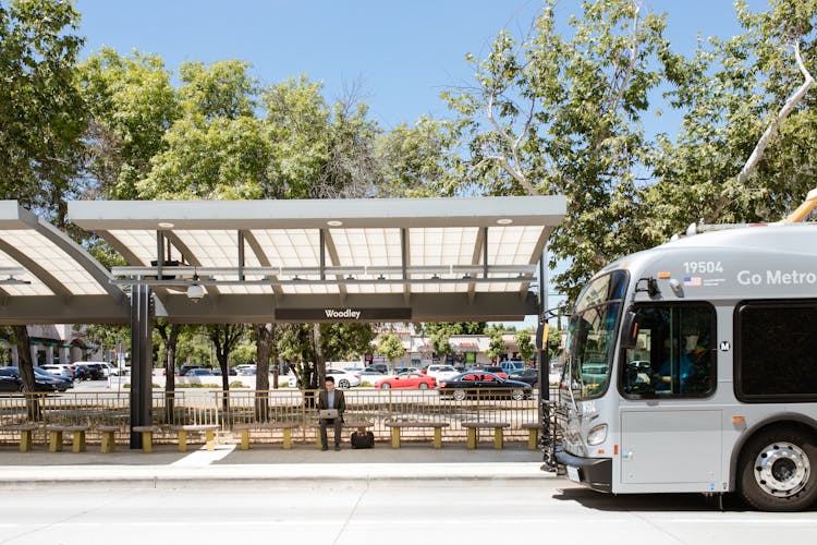 Man Working On A Bus Stop