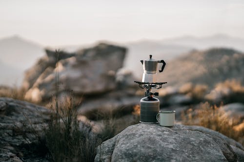 Free Coffee Brewing on a Camping Stove Stock Photo