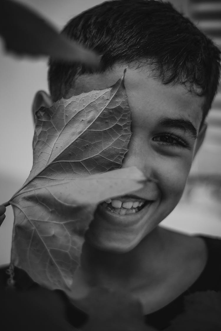 Kid Covering His Face