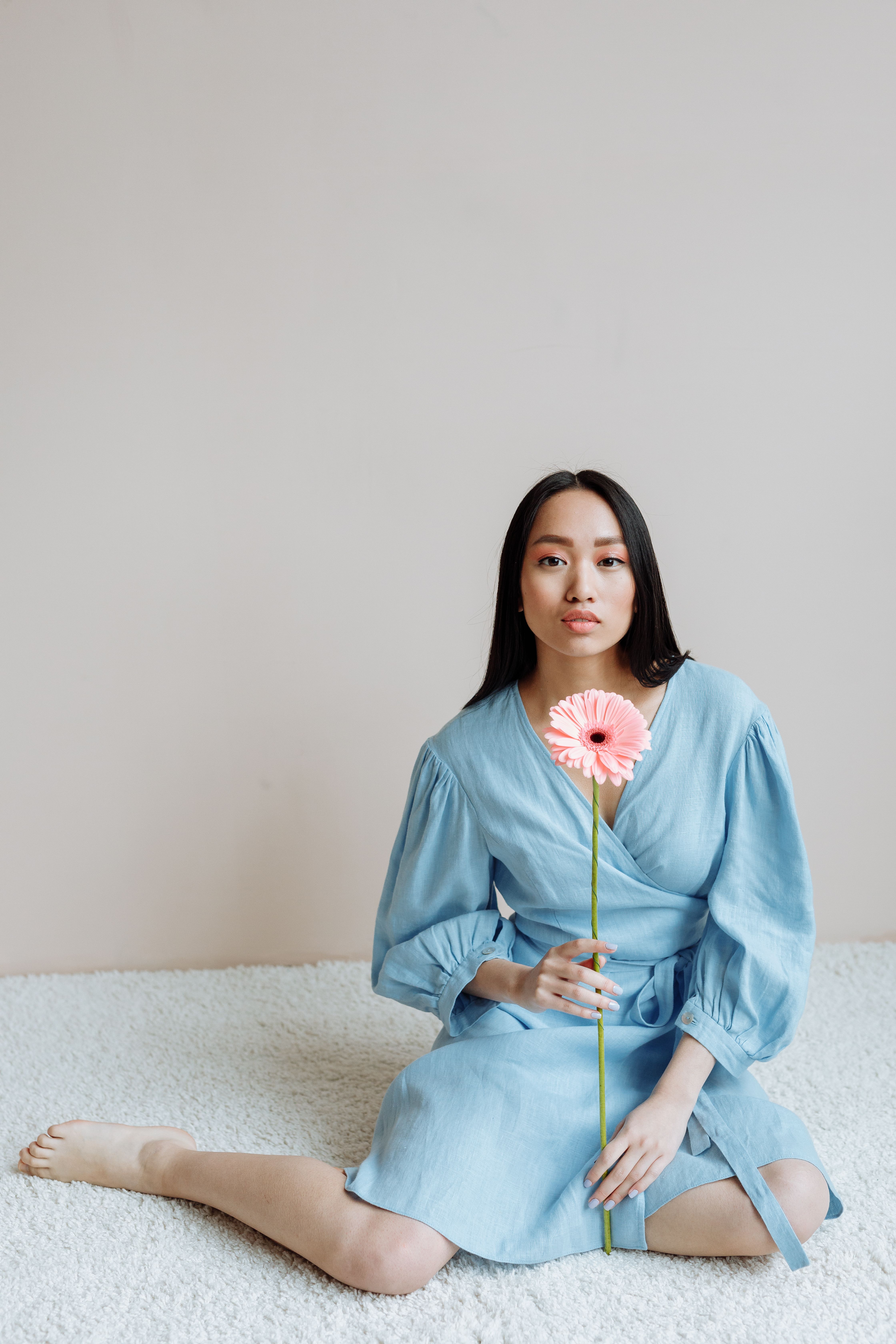 Woman in Blue Dress Sitting on the Floor · Free Stock Photo