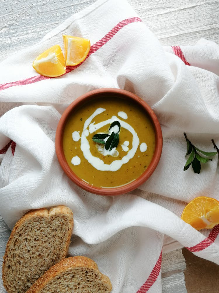 Bowl Of Soup On A White Cloth