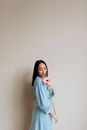 Woman holding a Gerbera Flower