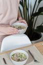 Person Holding White Ceramic Bowl