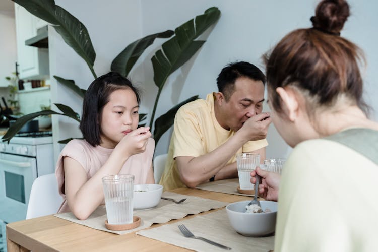 Family Eating Breakfast Together 