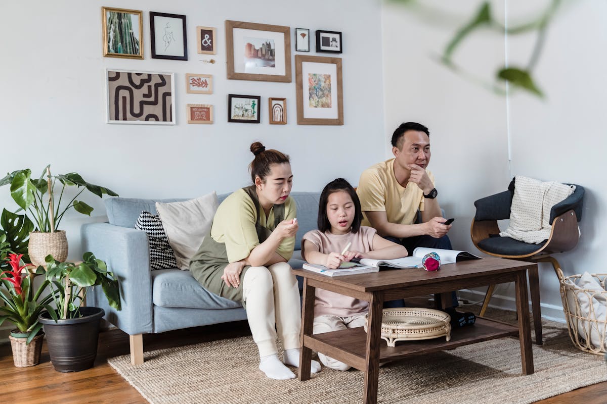 Family sitting together in a calm, comfortable living room