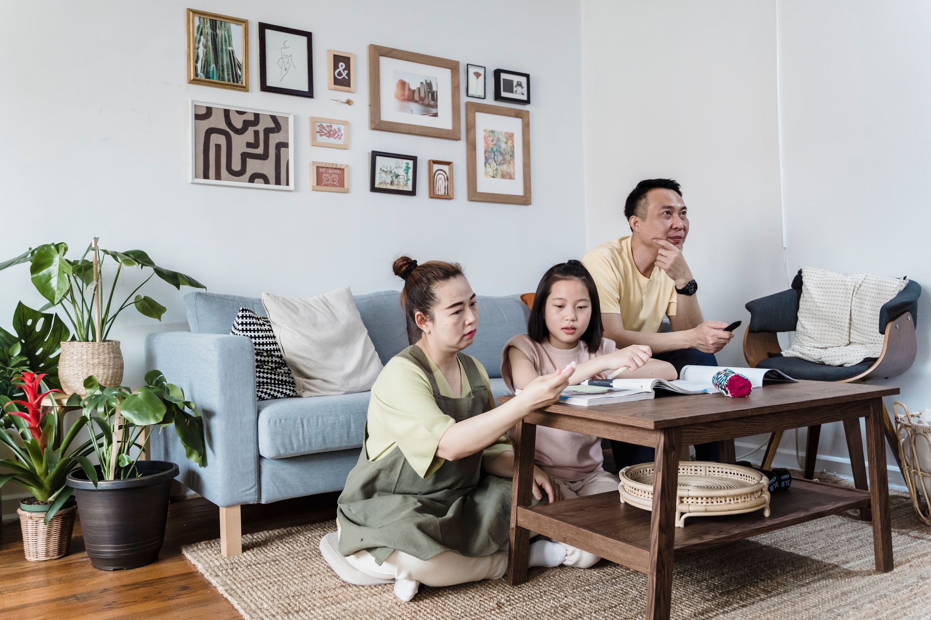 A family spending an evening together in a warmly lit living room — photo by Annushka Ahuja on Pexels