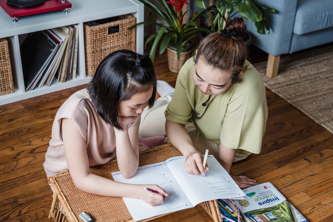 Free A Mother Teaching Her Daughter Stock Photo