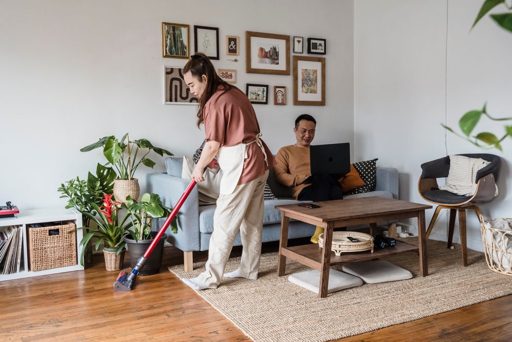 Cleaning a living room around a home working routine