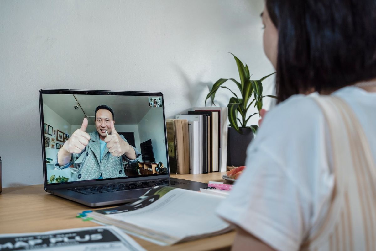 A student attending an online tuition lesson at home in Singapore