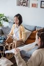 Adolescent Female folding Laundries