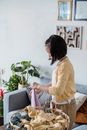 Adolescent Female folding Laundries