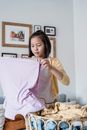 Teenager folding Laundries