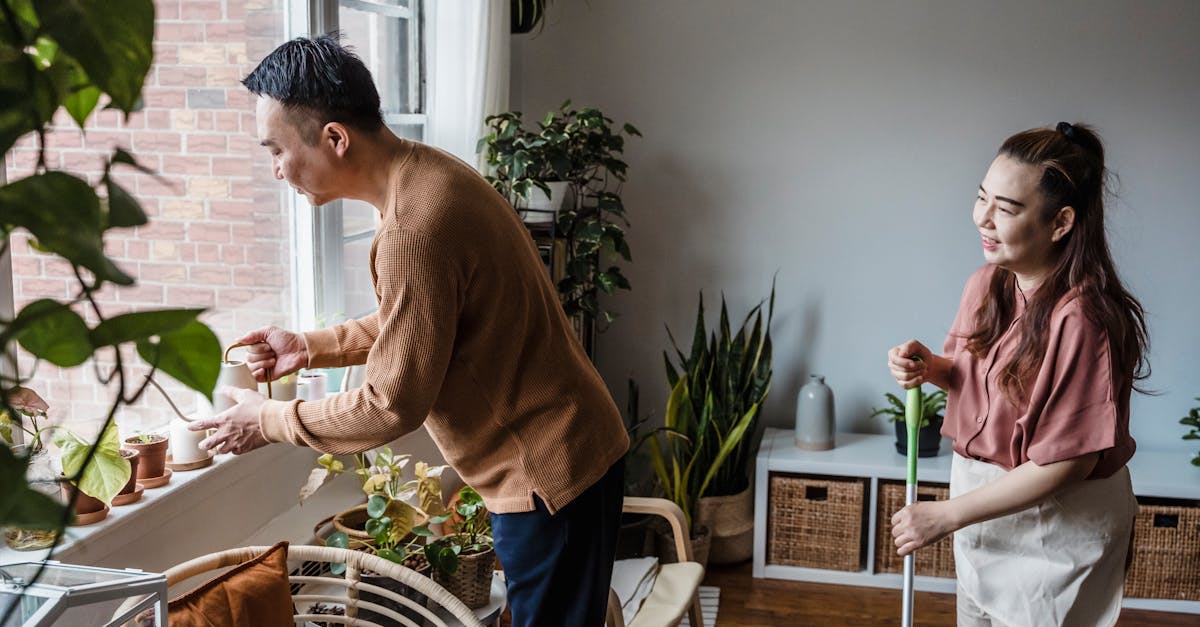 Couple Working Together On Household Chores