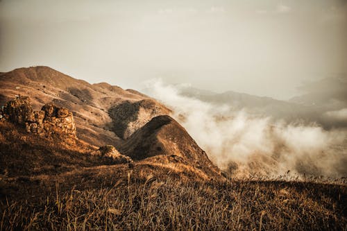 Brown Mountain Under the White Sky