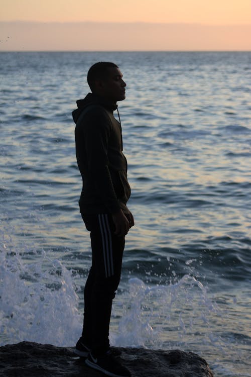 A Man Standing Near the Shore