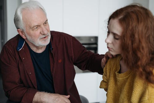 Free A Father Consoling His Daughter  Stock Photo