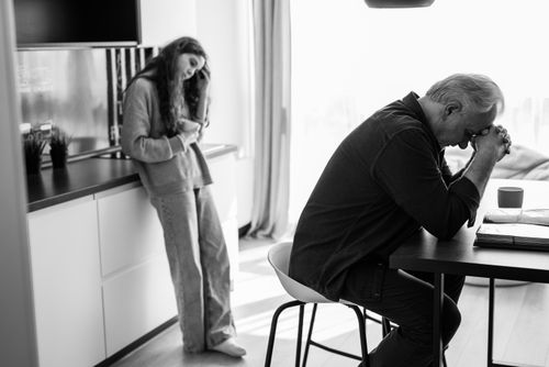 Free Heartfelt grayscale image showing family connection and emotion indoors. Stock Photo