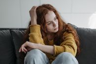 A Woman Sitting on the Couch