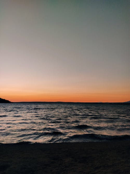 Beach Waves With Golden Horizon