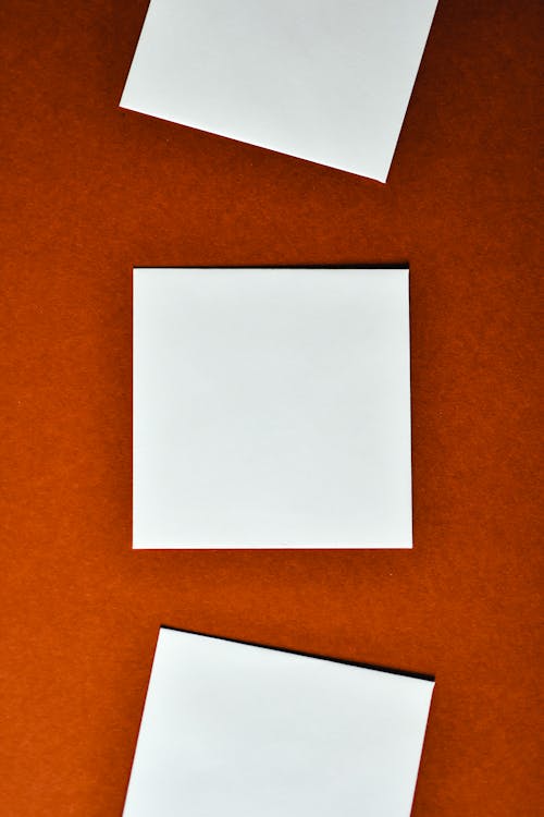 White Cards on red Surface