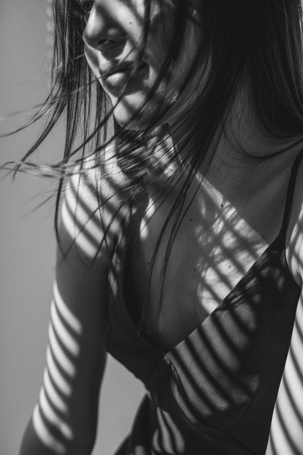Grayscale Photo of a Woman with Sleeveless Dress · Free Stock Photo