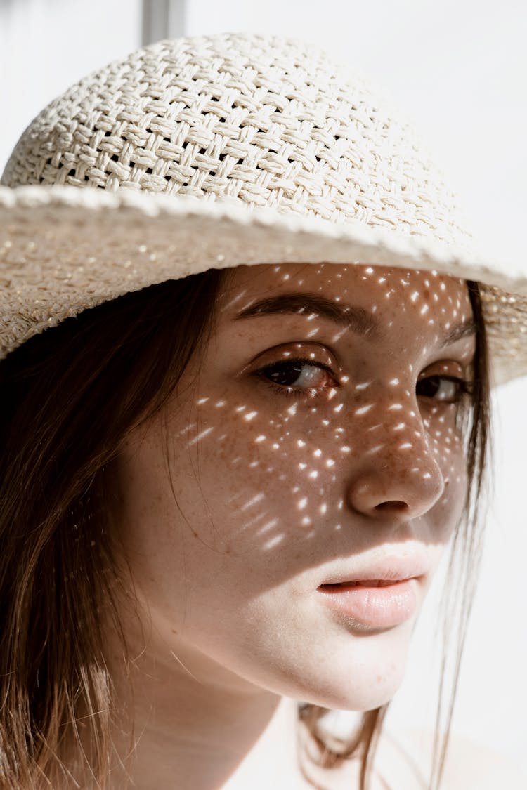 Woman Wearing White Sun Hat