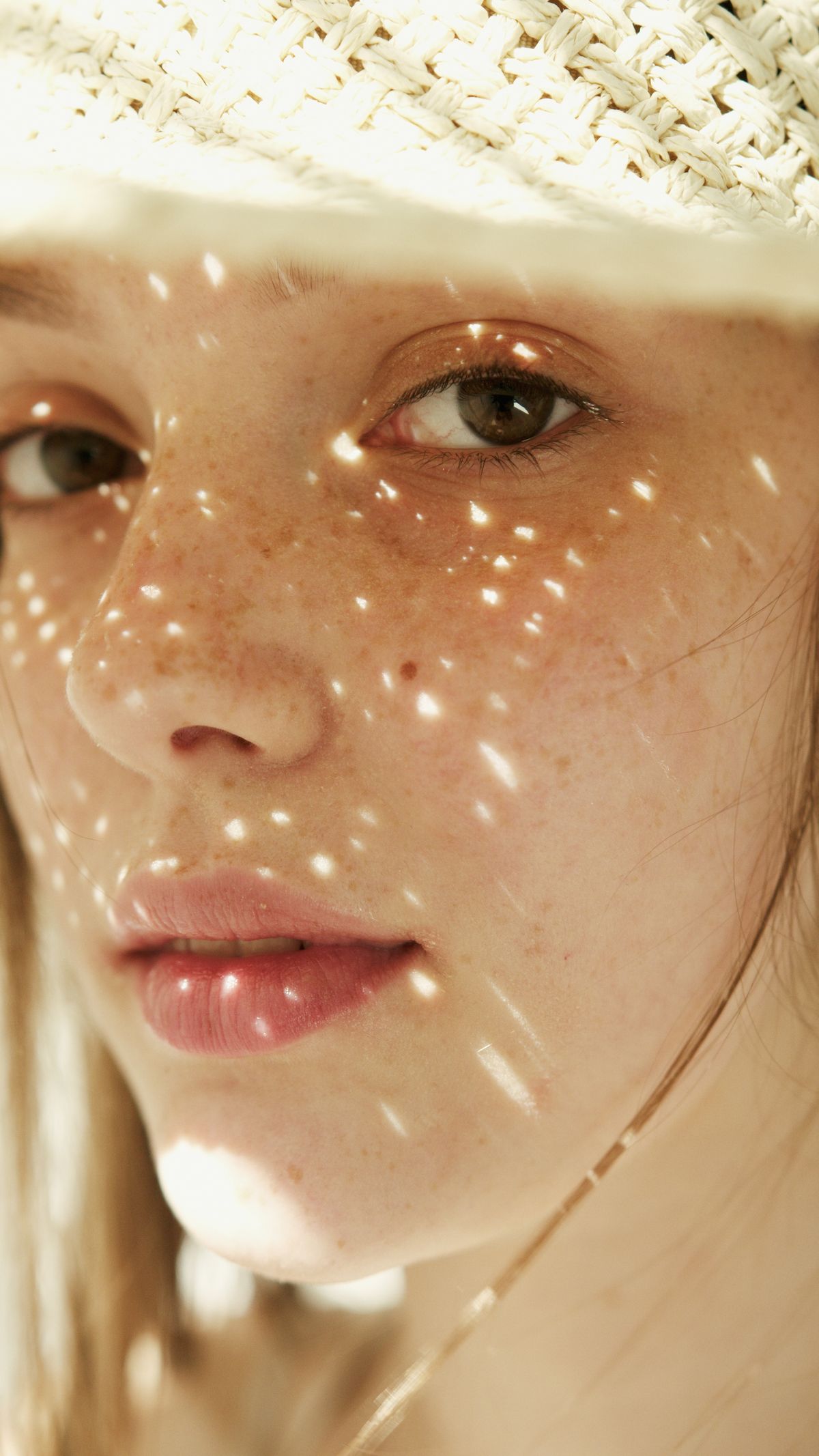 Close-up of a woman's face with natural luminous skin