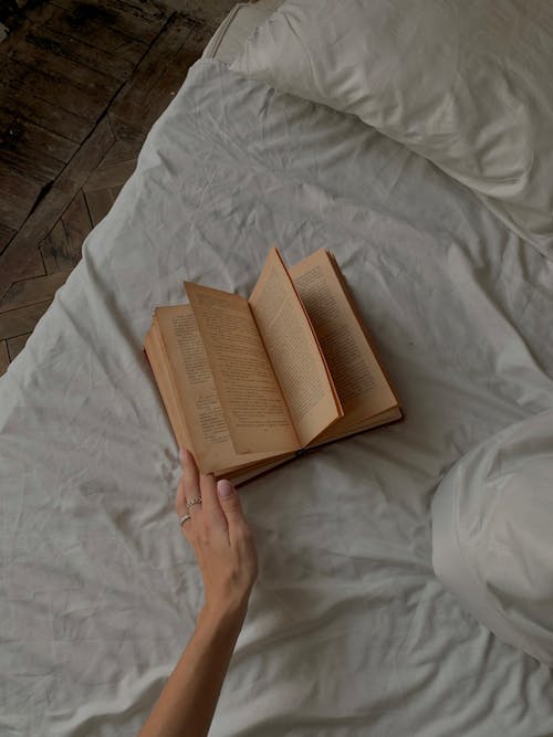 A Book on a Bed 