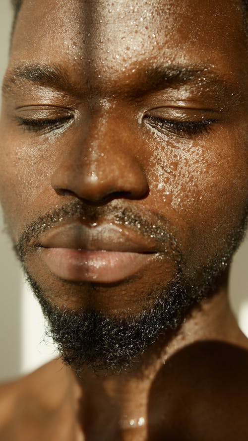 Portrait of a Man's Face with Sweat