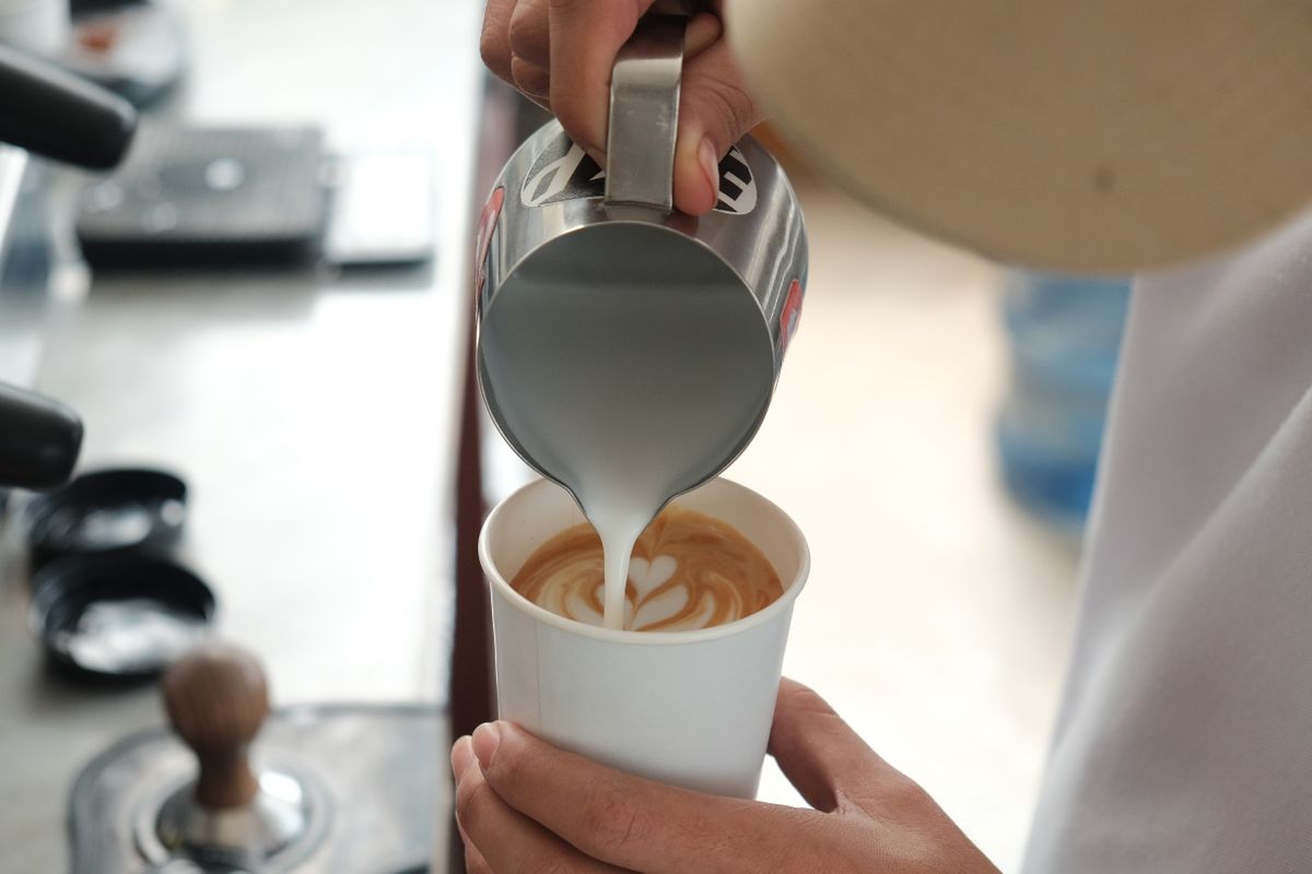 Cafe founder roasting coffee
