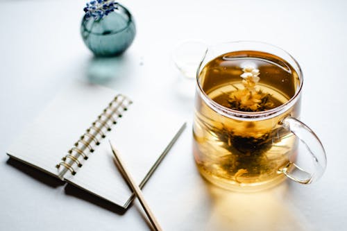 Light Brown Drink with Flowers