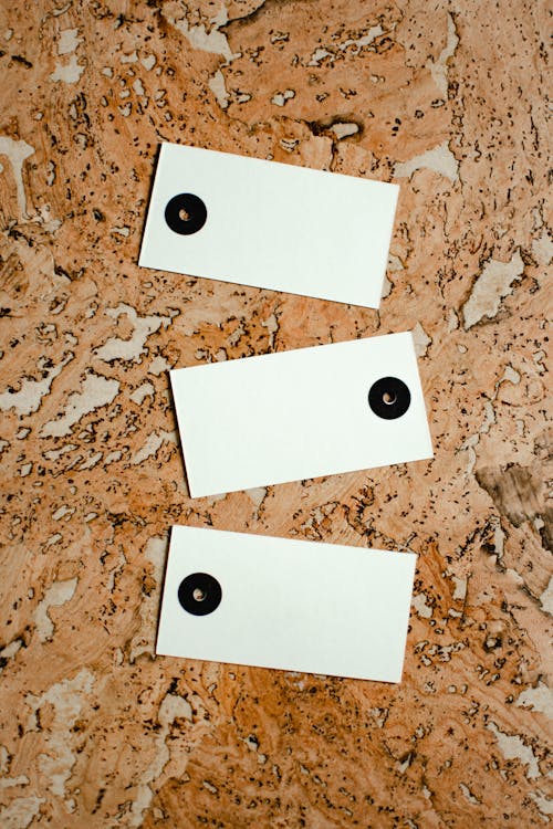 White Plain Paper Tags on a Flat Surface