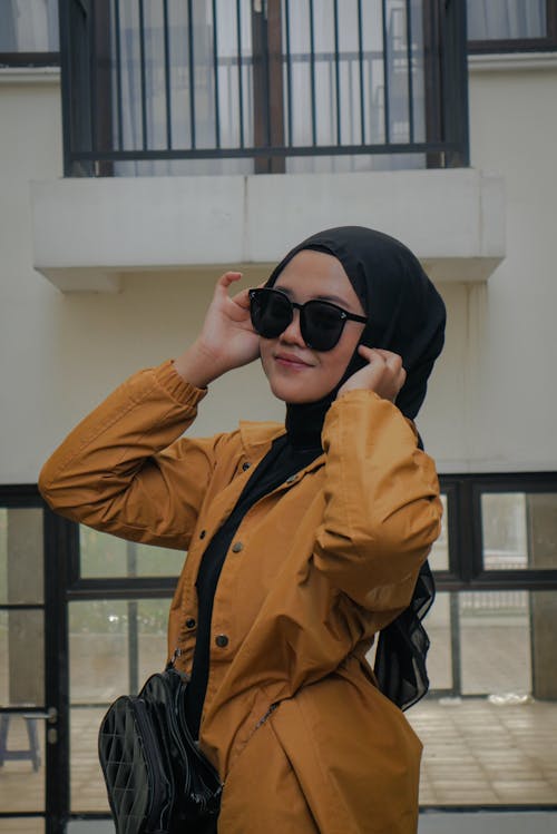 A Young Girl Wearing Black Hijab