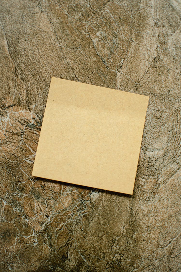 Brown Specialty Paper On Brown Rough Surface