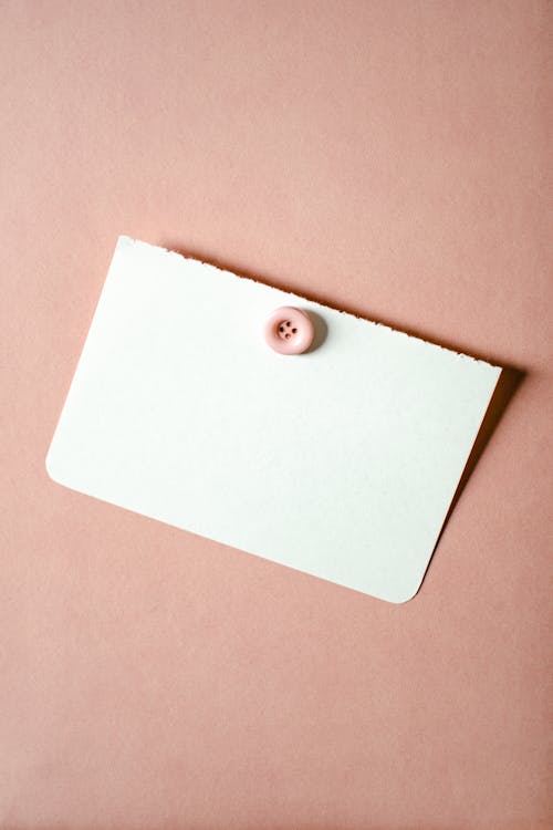 White Blank Card on Peach Background