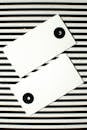 White Printer Paper on Black and White Striped Background