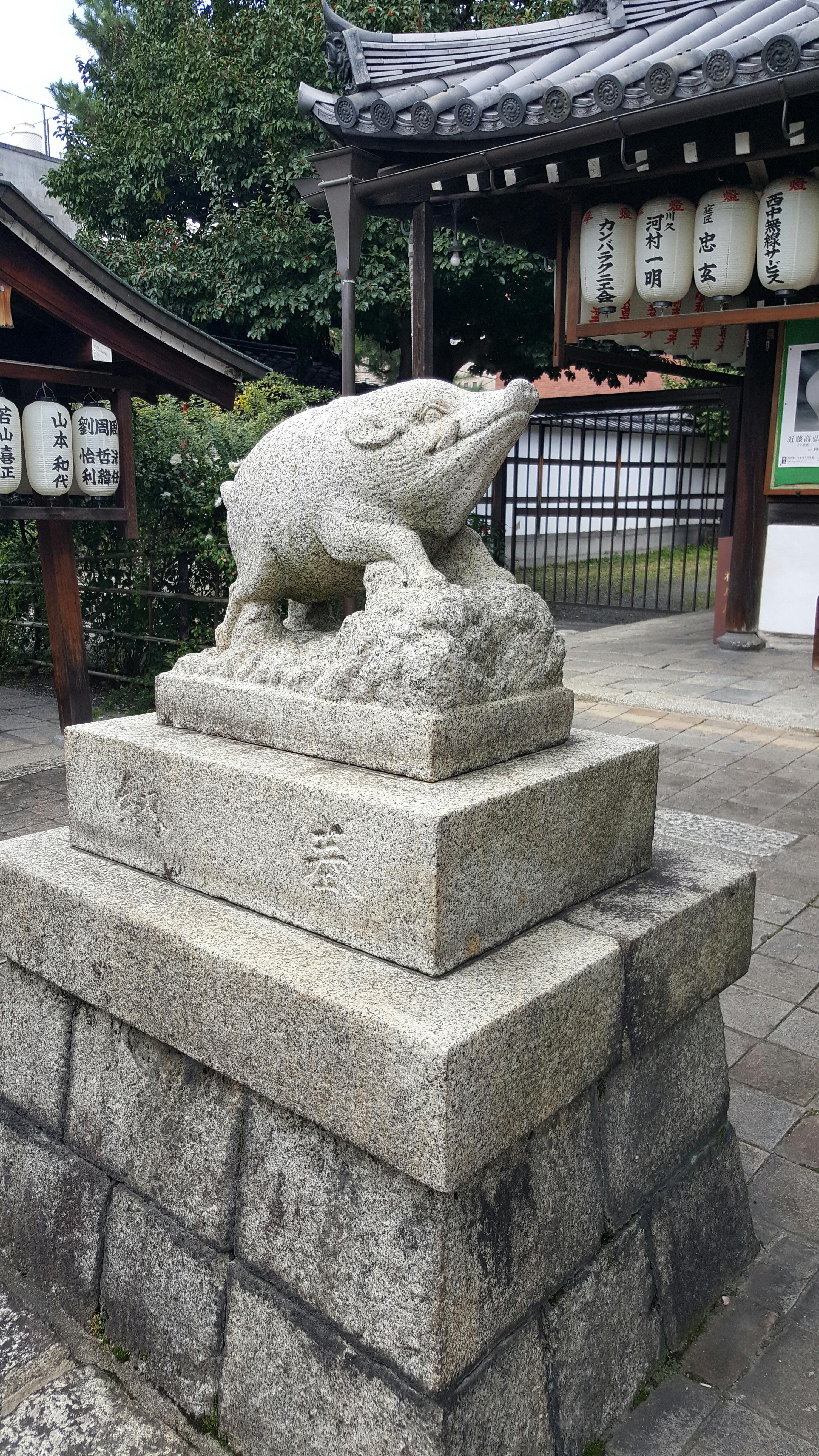 concrete statue near the temple