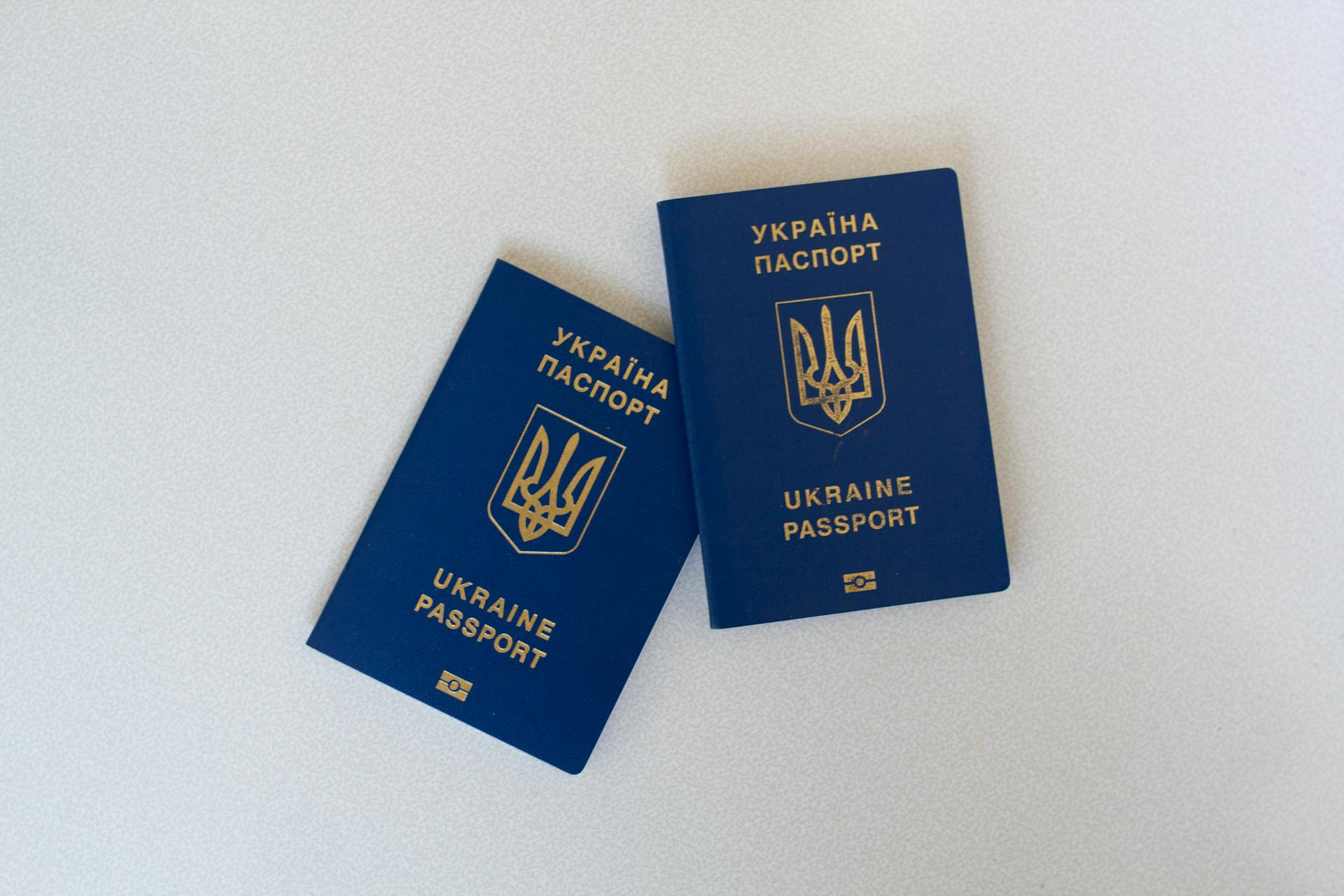 Passports on White Surface