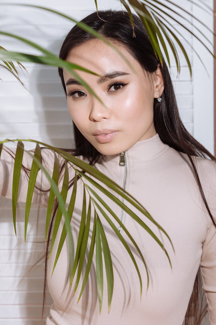 Woman In Beige Turtleneck Top