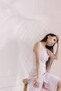 Woman in White Tank Top
