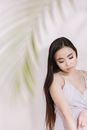 Woman in White Spaghetti Strap Top