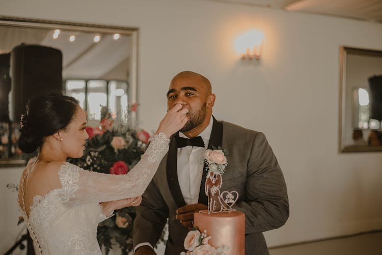 Bride Feeding Her Groom 