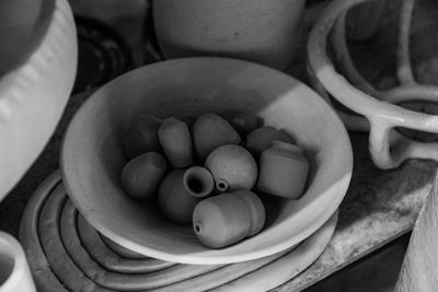 Ceramic bowls arranged in monochrome — photo by Roman Odintsov on Pexels