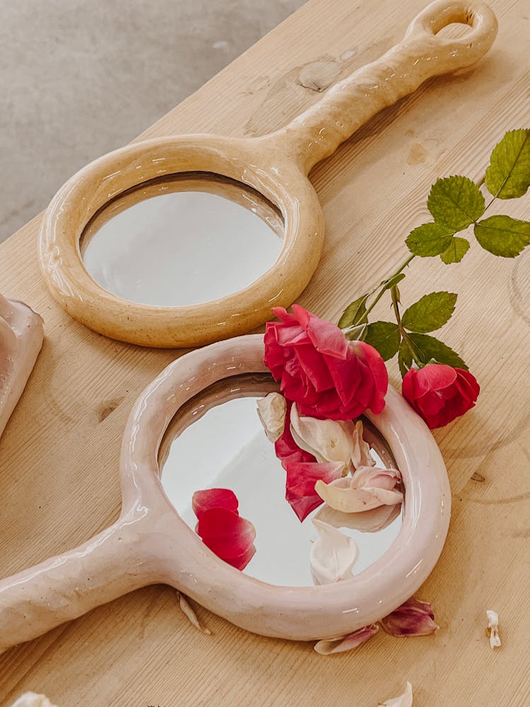 Close Up Of Mirrors And A Rose