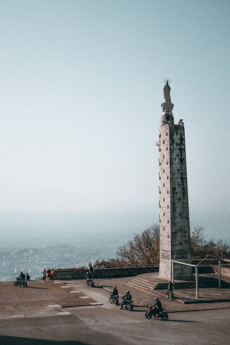 Tall Monument Overlooking City