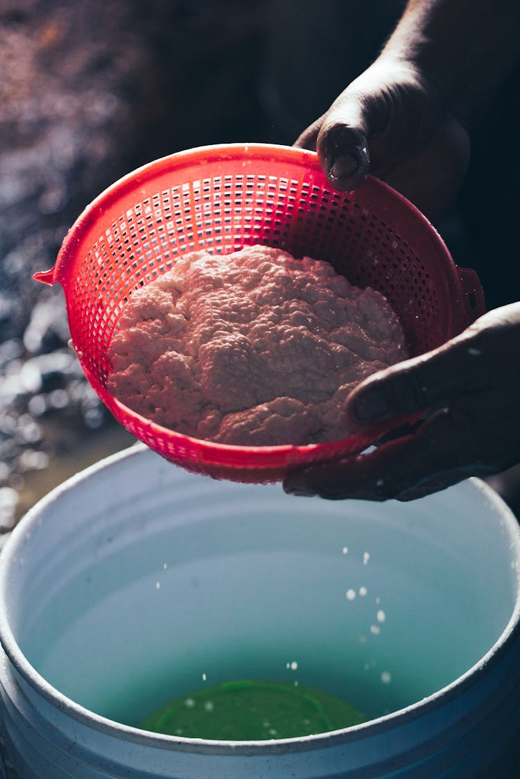 Person Preparing Homemade Cheese From Cottage Cheese