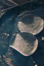 Round tortilla on black pan for frying