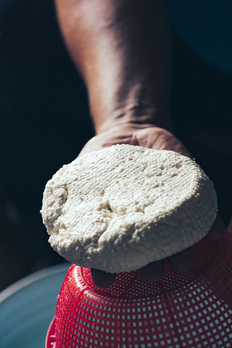 Man With Fresh Homemade Cheese On Colander