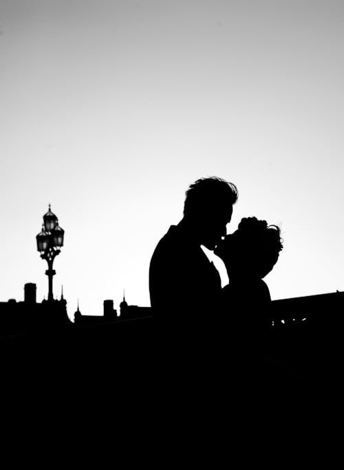 Silhouette of a Couple Kissing