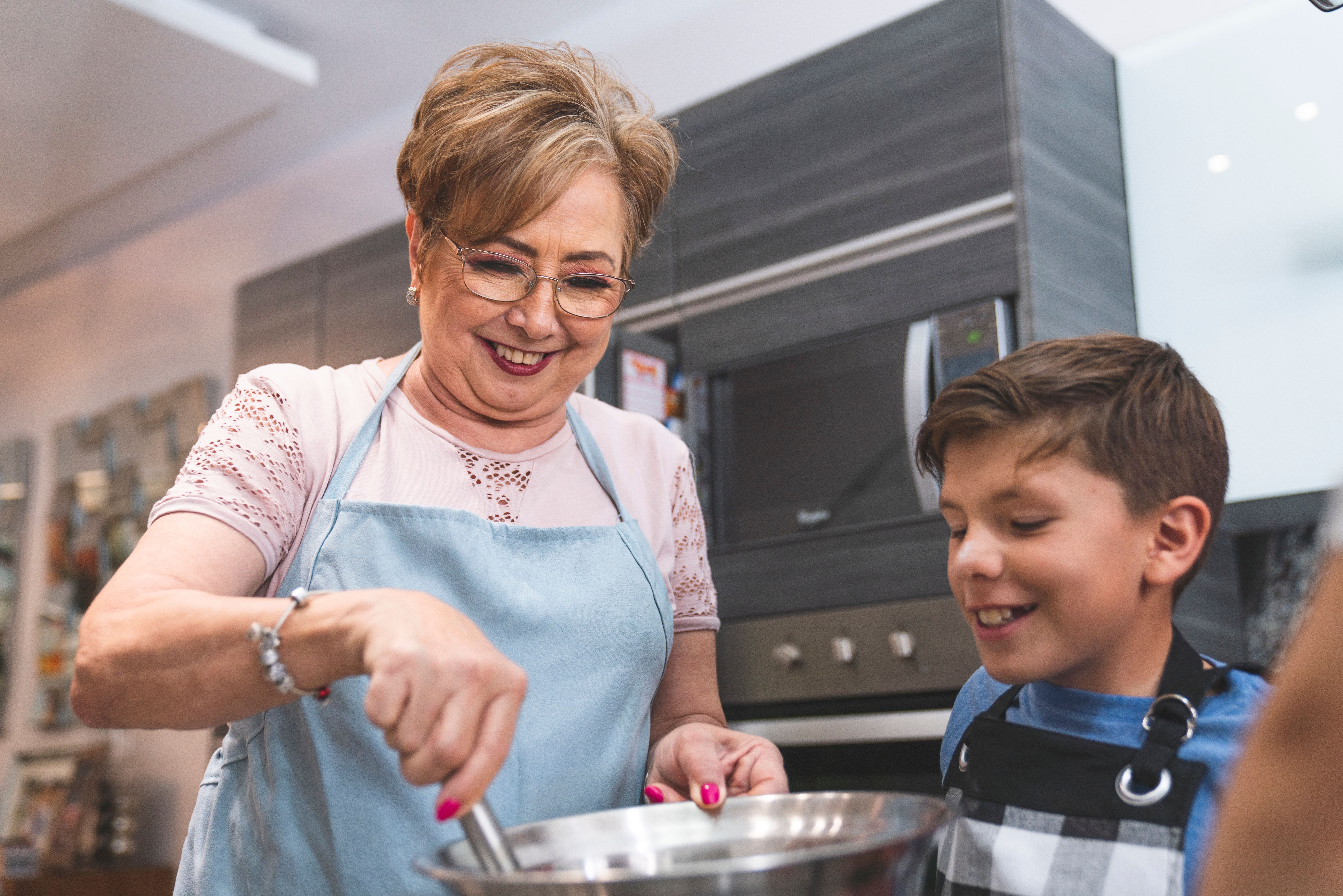 grandmother smiling in her kitchen